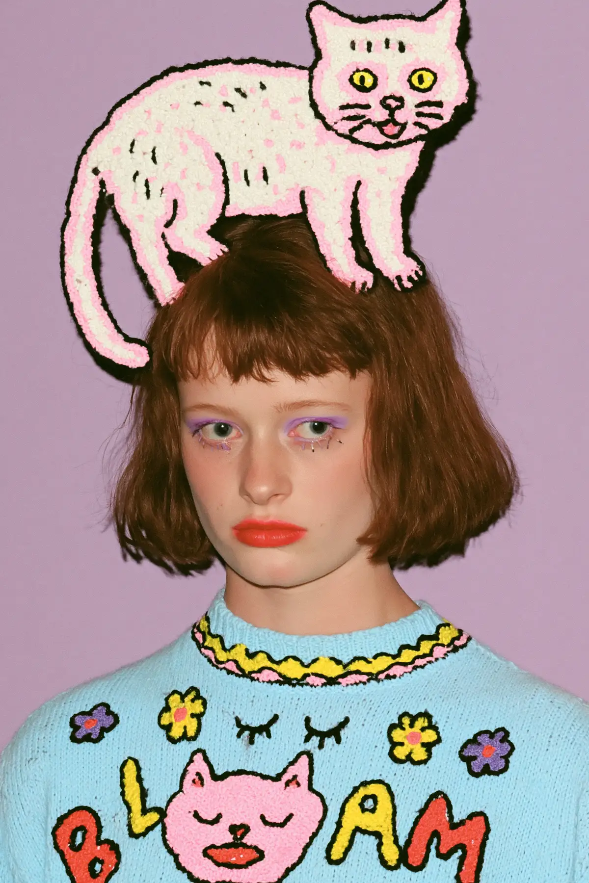 White cat on a head in PopArt style